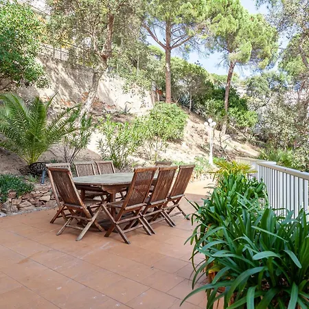 House In A Garden With View